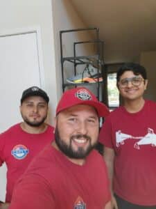 Trio contractors with customers